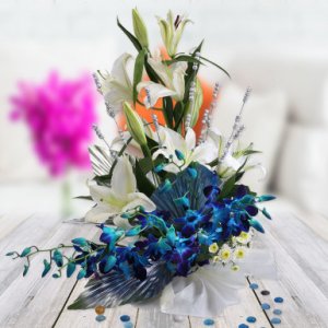 orchid and lily arrangement